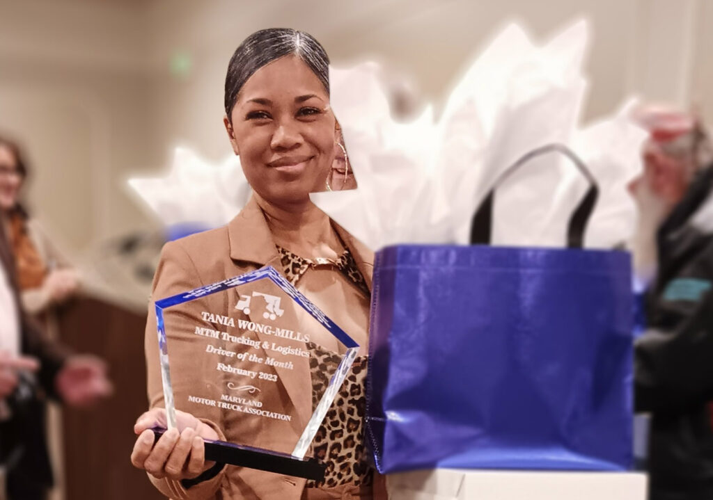 Tania Wong-Mills with her driver of the month trophy.