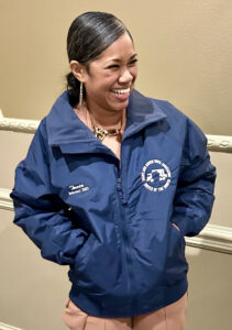 MTM driver Tania Wong-Mills with her driver of the month jacket.